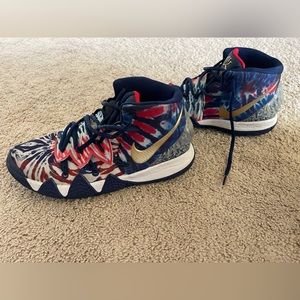 Nike boys Kyrie basketball sneaks. Used, good condition.  Not worn often. Size 7